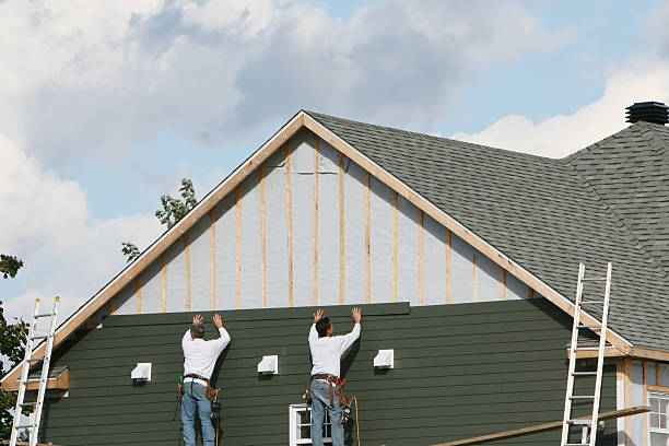 Professional Vinyl Siding technician working in Clearville, PA